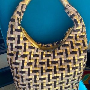 Gorgeous designer bag from Italy. Very classy!